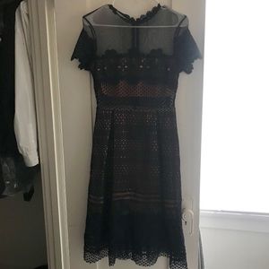 Lace illusion dress with nude lining and navy lace
